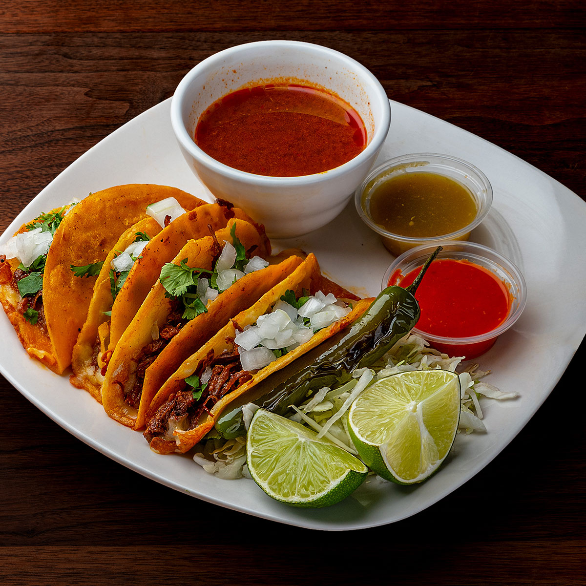 Hard shell tacos and three sauces catered by Fusion Catering in Santa Fe New Mexico