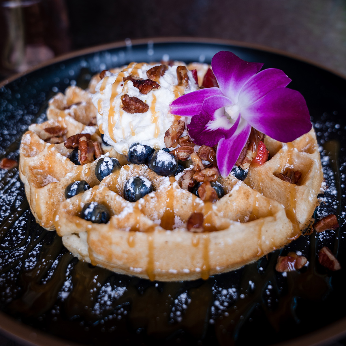 Breakfast waffle topped with blueberries catered by Fusion Catering in Santa Fe New Mexico